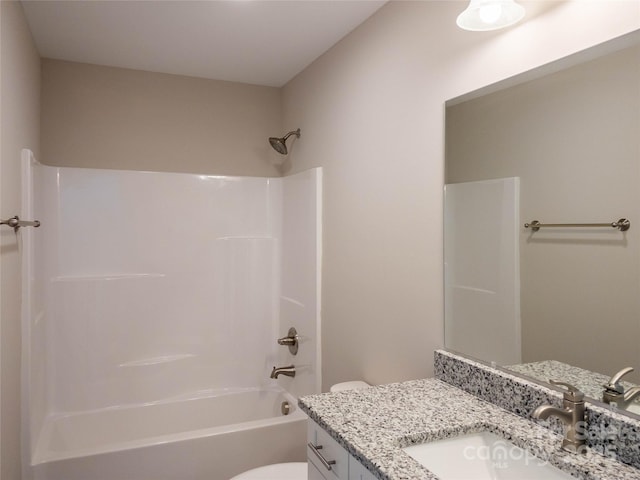 full bathroom featuring shower / bathtub combination, vanity, and toilet