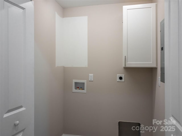 laundry room with cabinets, hookup for an electric dryer, and hookup for a washing machine