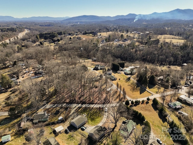 drone / aerial view featuring a mountain view