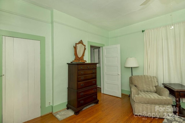 living area with light hardwood / wood-style floors