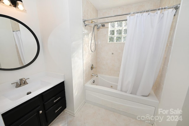 bathroom featuring shower / bath combination with curtain, vanity, and tile patterned flooring