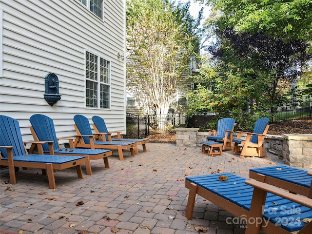 view of patio featuring a fire pit