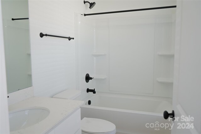 full bathroom with vanity, shower / bath combination, and toilet