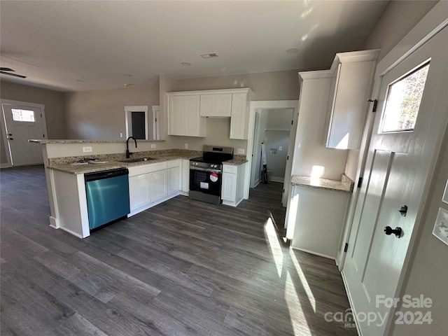 kitchen featuring sink, white cabinetry, dark hardwood / wood-style flooring, kitchen peninsula, and stainless steel appliances