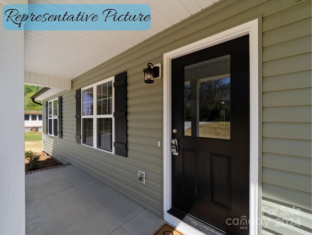 property entrance featuring a porch