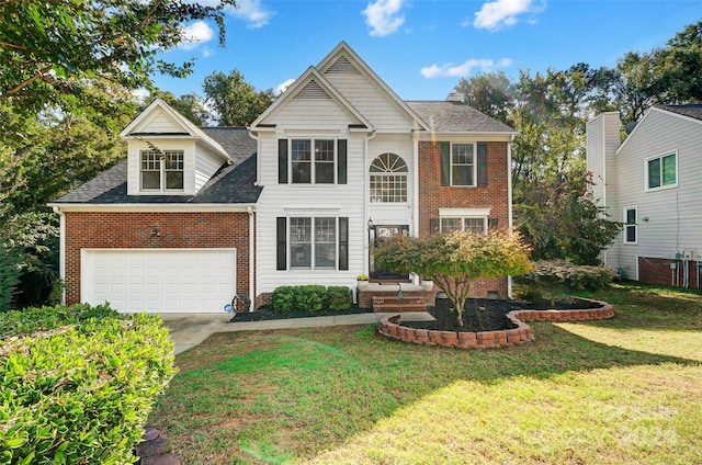 view of front of house featuring a garage and a front lawn