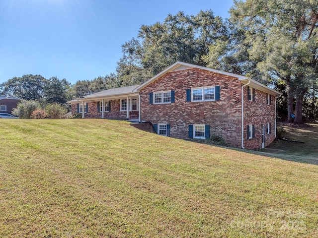 view of front of home with a front lawn