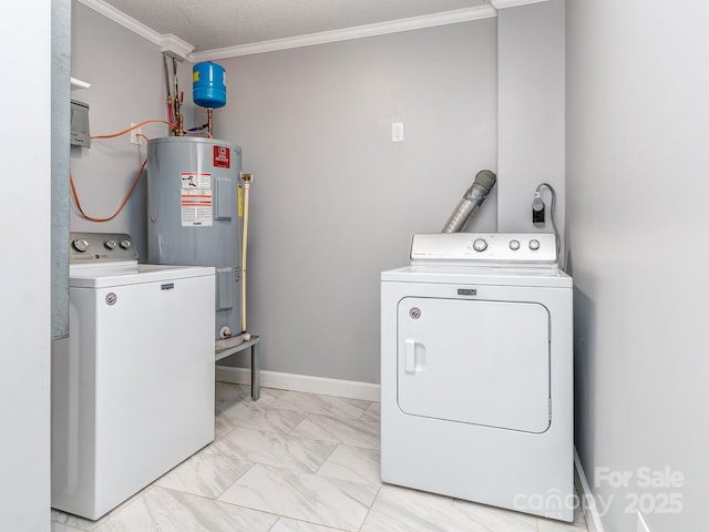 washroom with washing machine and clothes dryer, water heater, a textured ceiling, and ornamental molding