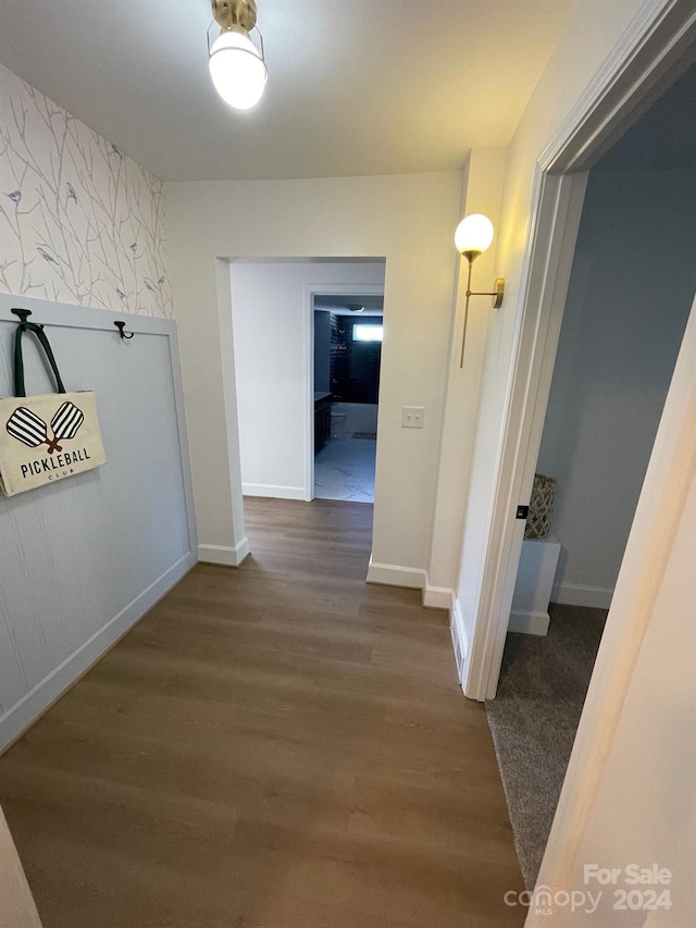 corridor featuring hardwood / wood-style flooring