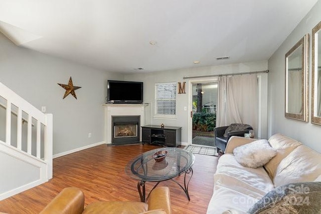 living room with hardwood / wood-style flooring