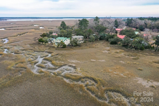 drone / aerial view featuring a water view and a rural view