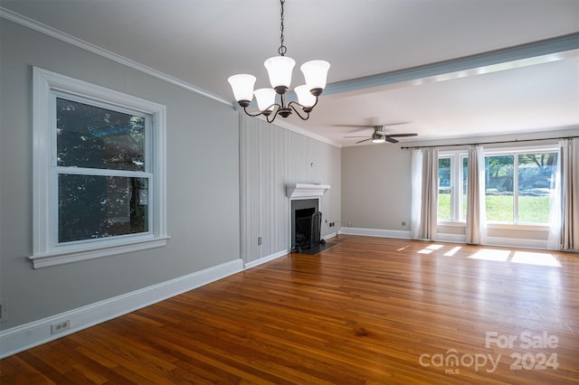 unfurnished living room with ornamental molding, ceiling fan with notable chandelier, and hardwood / wood-style floors