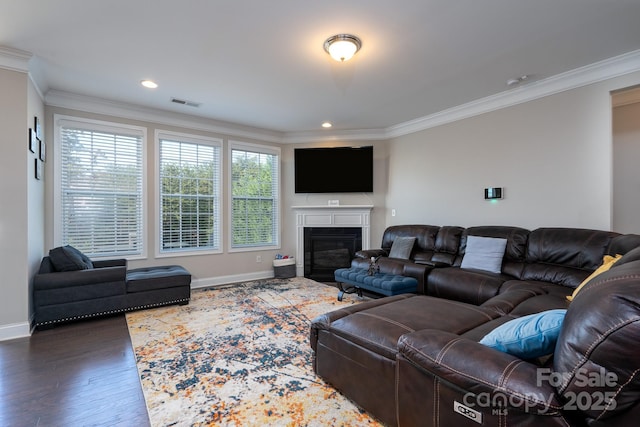 living room with crown molding and dark wood-type flooring