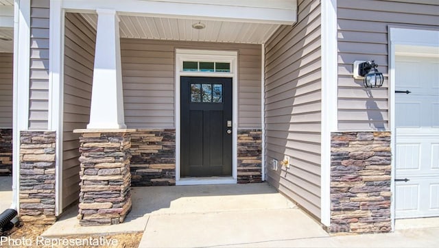 entrance to property with a garage