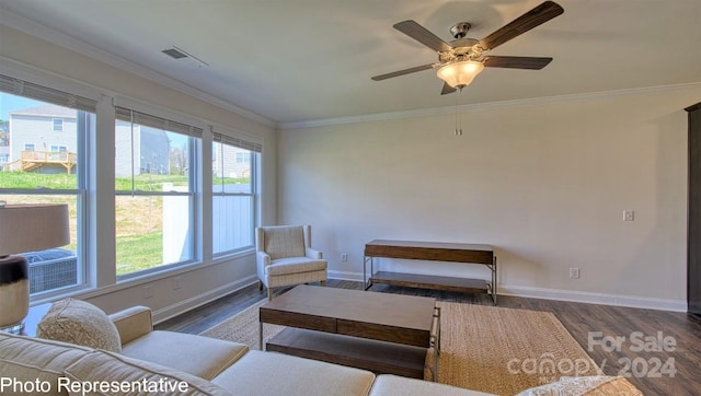 living room featuring crown molding, dark hardwood / wood-style flooring, and ceiling fan