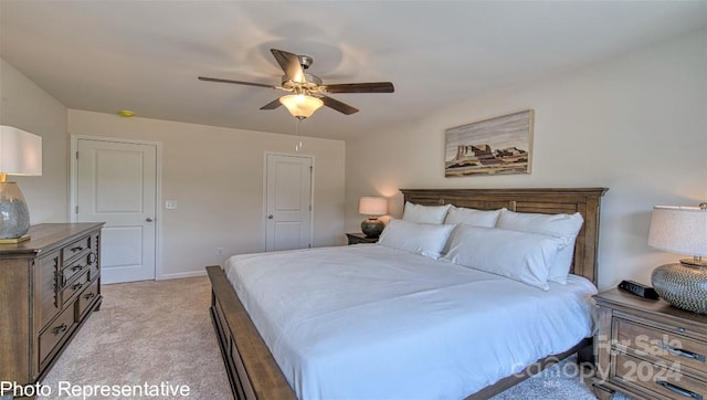 carpeted bedroom featuring ceiling fan