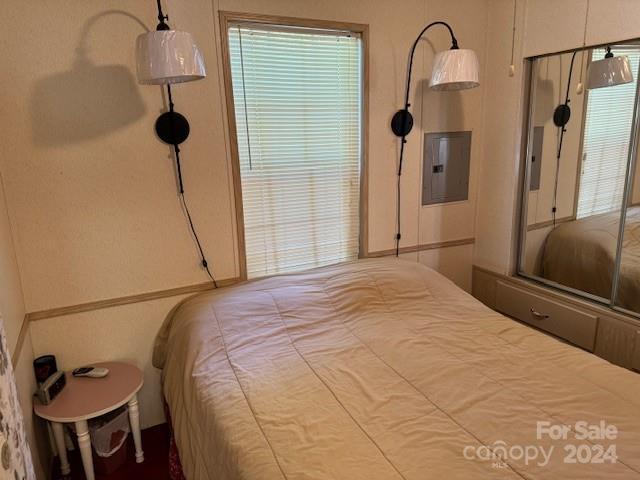 201 Deer Park Rd, Mount Gilead, NC 27306 - bedroom featuring electric panel