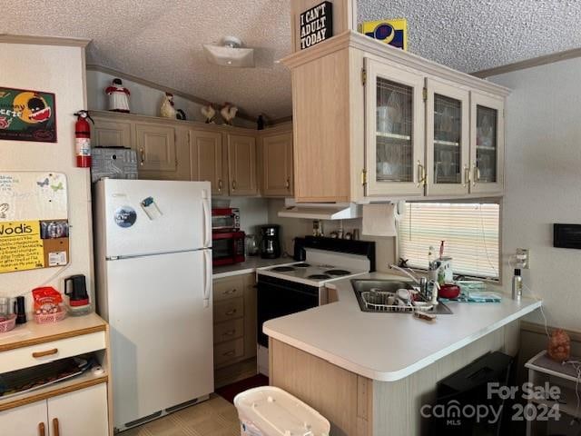 kitchen featuring kitchen peninsula, white appliances, a textured ceiling, a kitchen breakfast bar, and light brown cabinetry