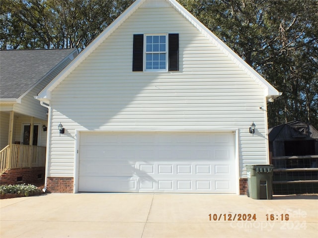 view of home's exterior with a garage