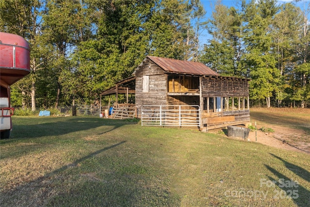 exterior space featuring an outbuilding