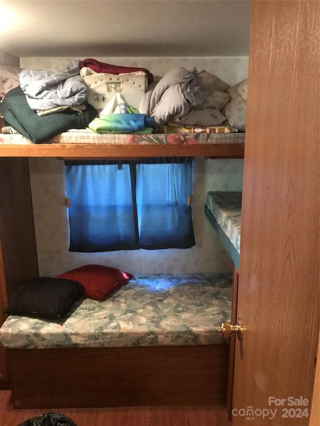 bedroom featuring hardwood / wood-style floors