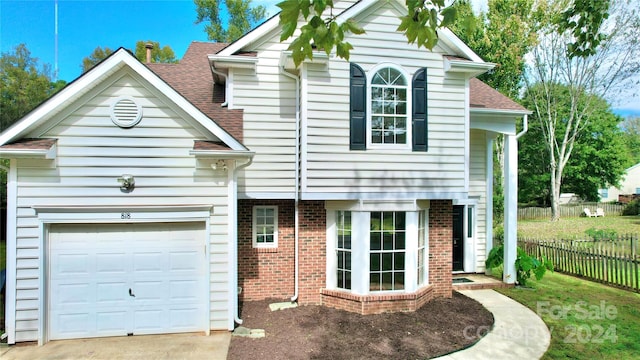 view of front of property featuring a garage