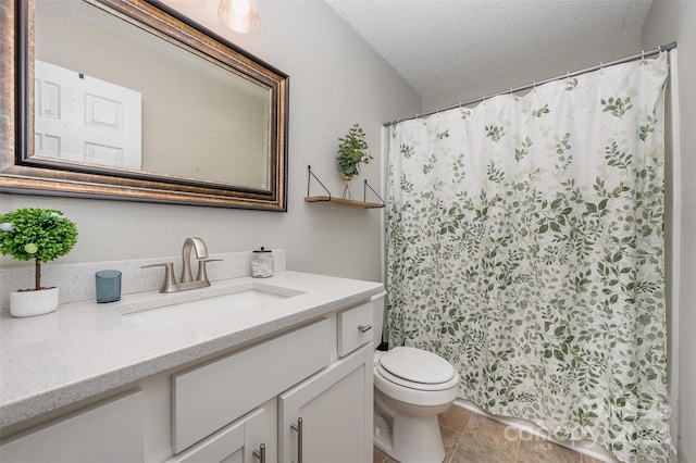 full bath with vanity, a textured ceiling, toilet, and a shower with curtain