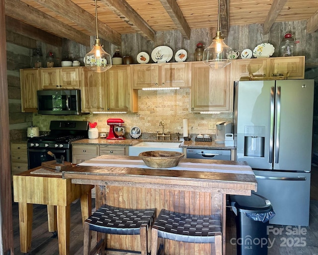 kitchen featuring sink, hanging light fixtures, stainless steel appliances, wooden ceiling, and beamed ceiling