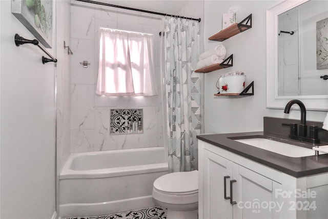 full bathroom featuring vanity, toilet, and shower / tub combo