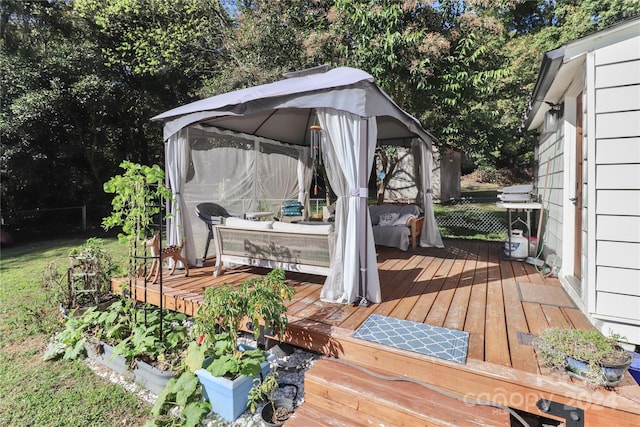 wooden deck featuring a gazebo