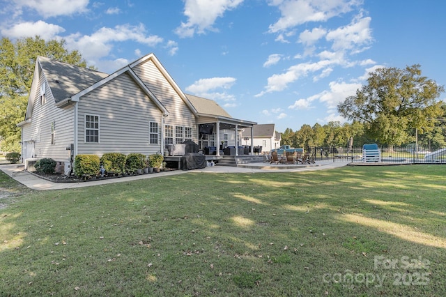 9404 Perimeter Ct, Zebulon, NC 27597 - back of house with a deck and a patio area