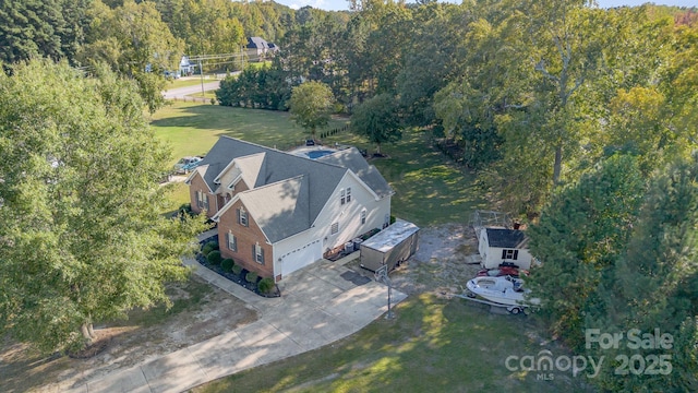 9404 Perimeter Ct, Zebulon, NC 27597 - aerial view of property and surrounding area with a forest