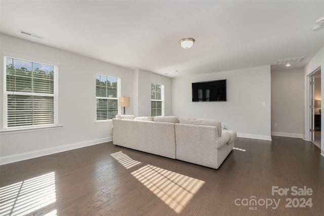 living room featuring dark hardwood / wood-style floors