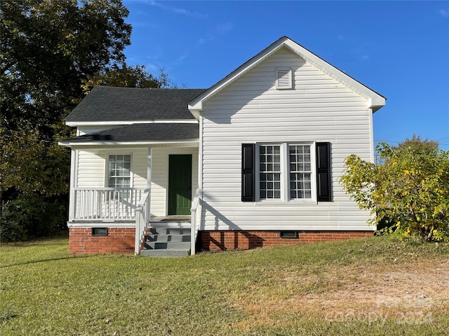 view of front of house featuring a porch and a front lawn