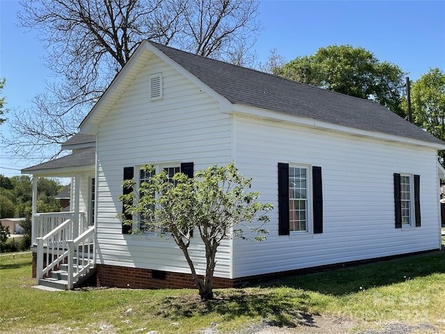 view of property exterior featuring a yard