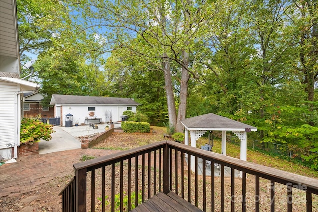 deck with a patio and a gazebo