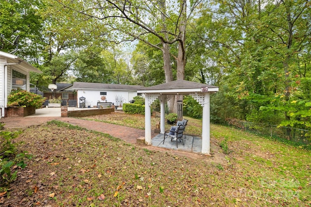 view of yard with a patio and a gazebo