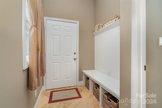 mudroom featuring light tile patterned floors