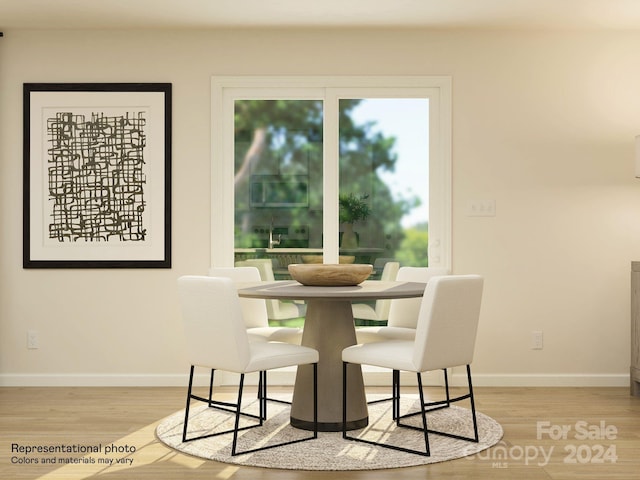 dining room with light hardwood / wood-style flooring