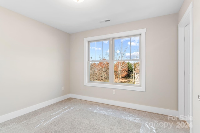 empty room featuring carpet floors