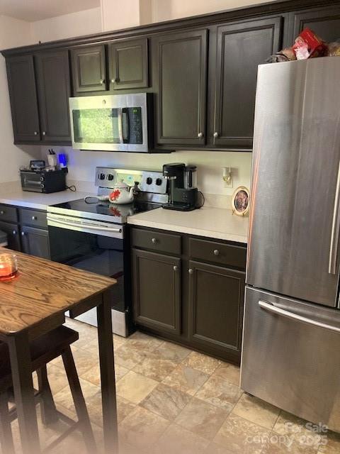 kitchen with appliances with stainless steel finishes