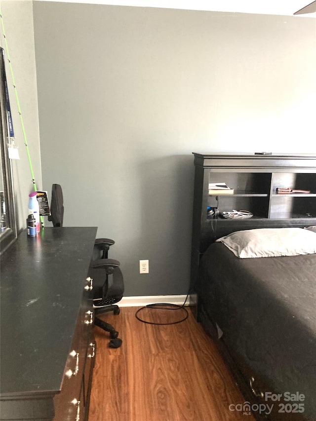 bedroom featuring hardwood / wood-style floors