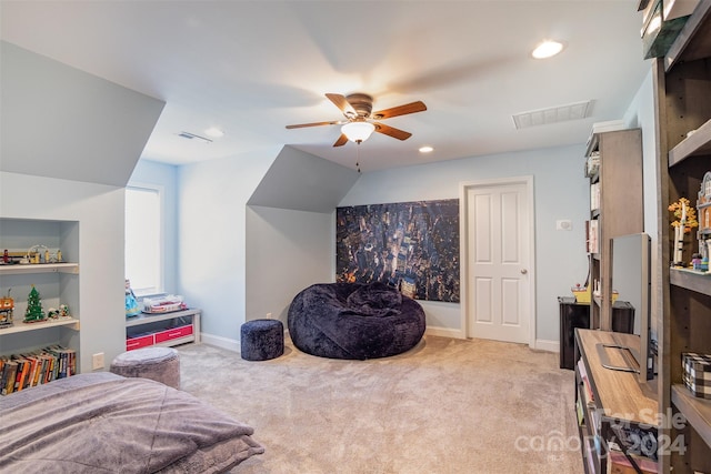 carpeted bedroom featuring ceiling fan