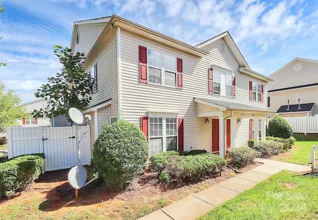 multi unit property featuring a garage