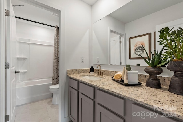 full bathroom with tile patterned flooring, vanity, toilet, and shower / bathtub combination with curtain