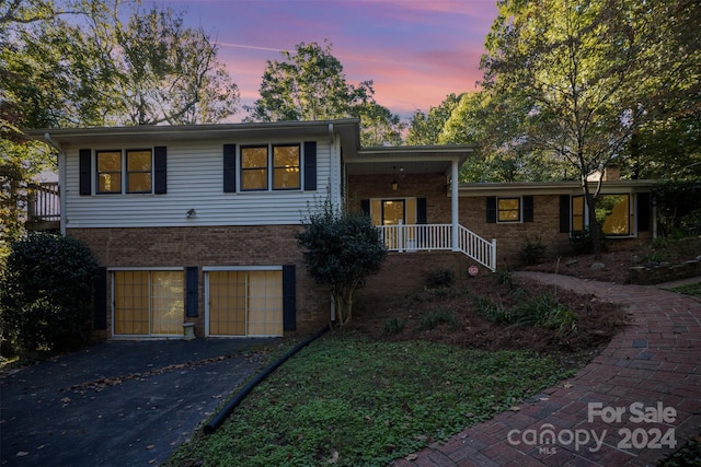 view of front of home featuring a garage