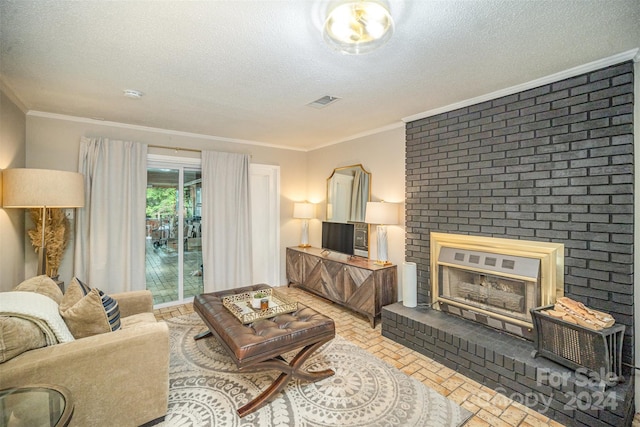 living room featuring crown molding, a textured ceiling, and a brick fireplace