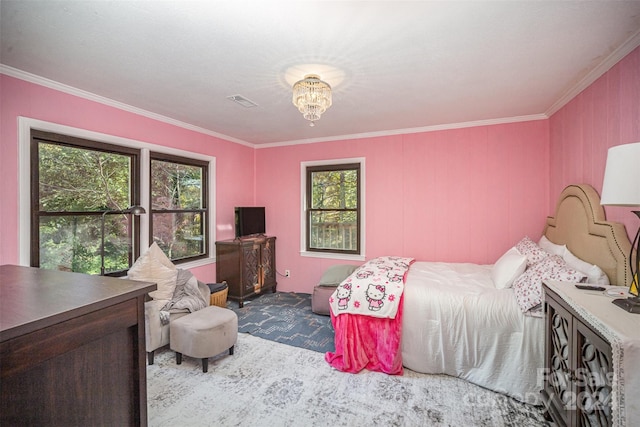 bedroom with multiple windows and ornamental molding