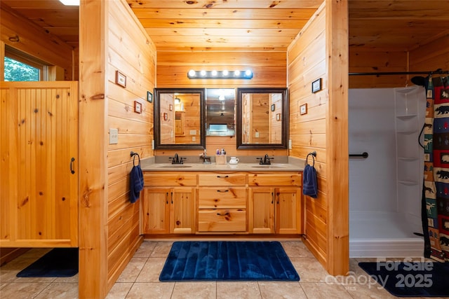 bathroom with wooden walls and wood ceiling