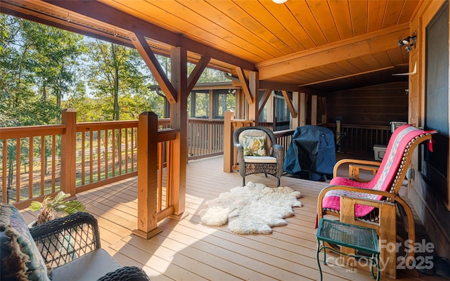 wooden deck featuring grilling area